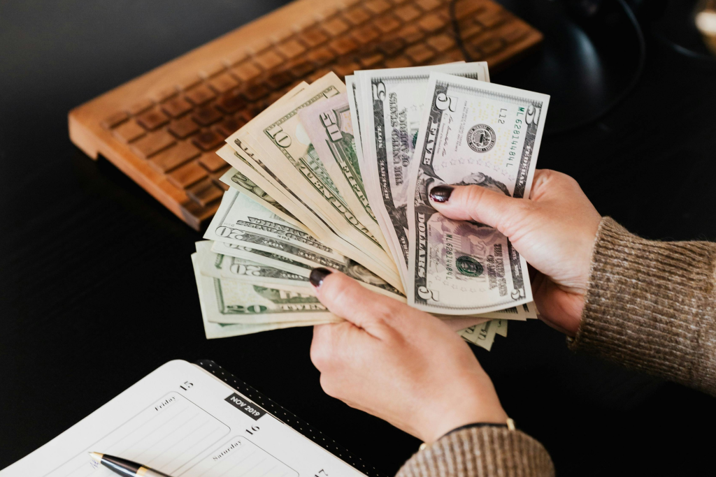 a person holding money